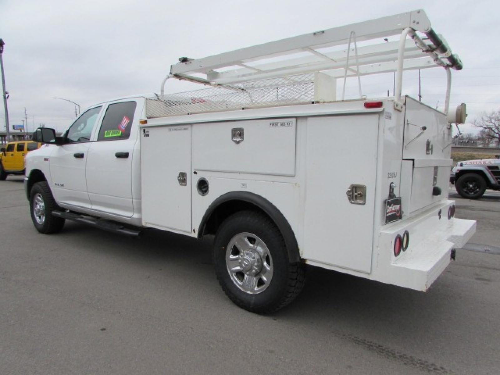 2020 White /Gray RAM 3500 Tradesman Crew Cab 4WD (3C63R3GJ0LG) with an 6.4L V8 OHV 16V engine, 8 speed automatic transmission, located at 4562 State Avenue, Billings, MT, 59101, (406) 896-9833, 45.769516, -108.526772 - Photo #1